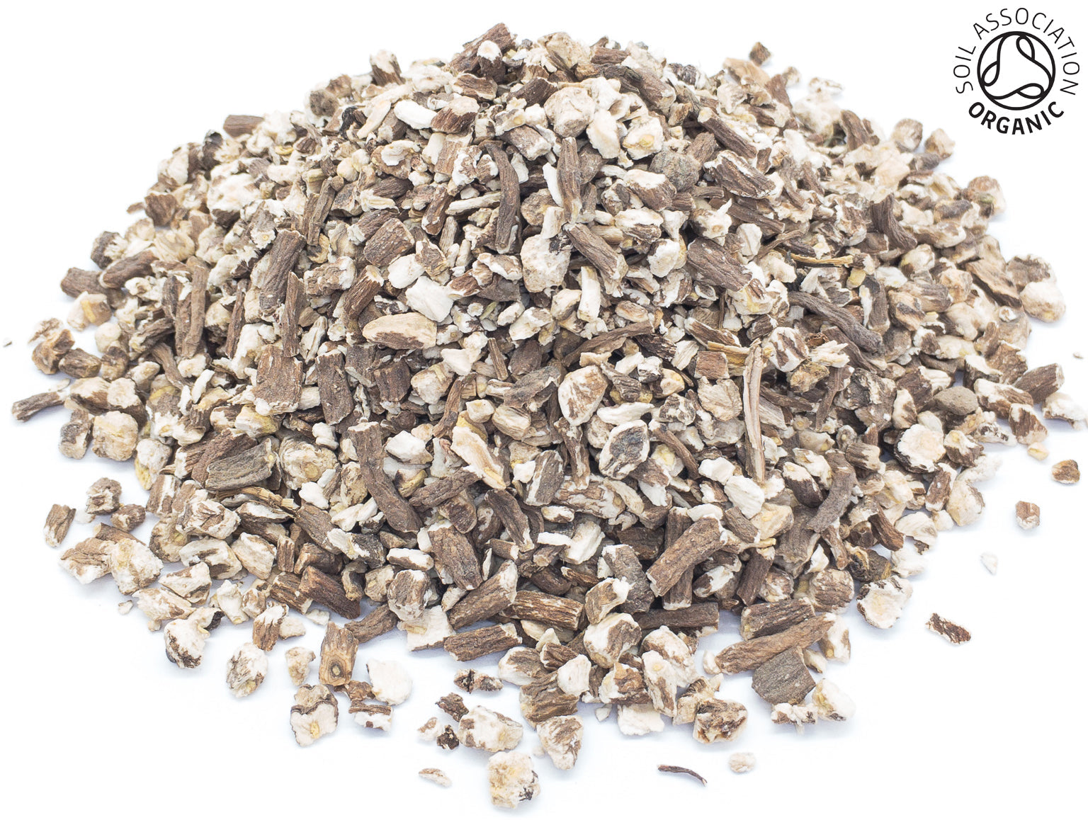 A small pile of dried, cut, organic dandelion root on a white background with the Soil Association Organic Logo in the top right corner