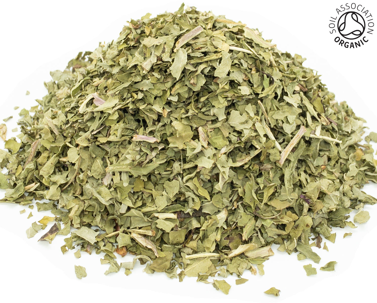 A small pile of dried, cut, organic dandelion leaf on a white background with the Soil Association Organic Logo in the top right corner