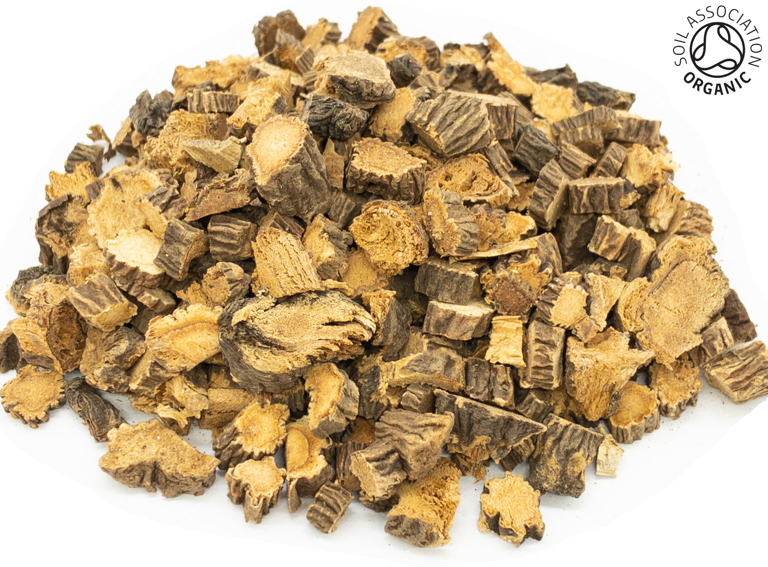 A small pile of dried, cut, organic gentian root, on a white background with the Soil Association Organic Logo in the top right corner