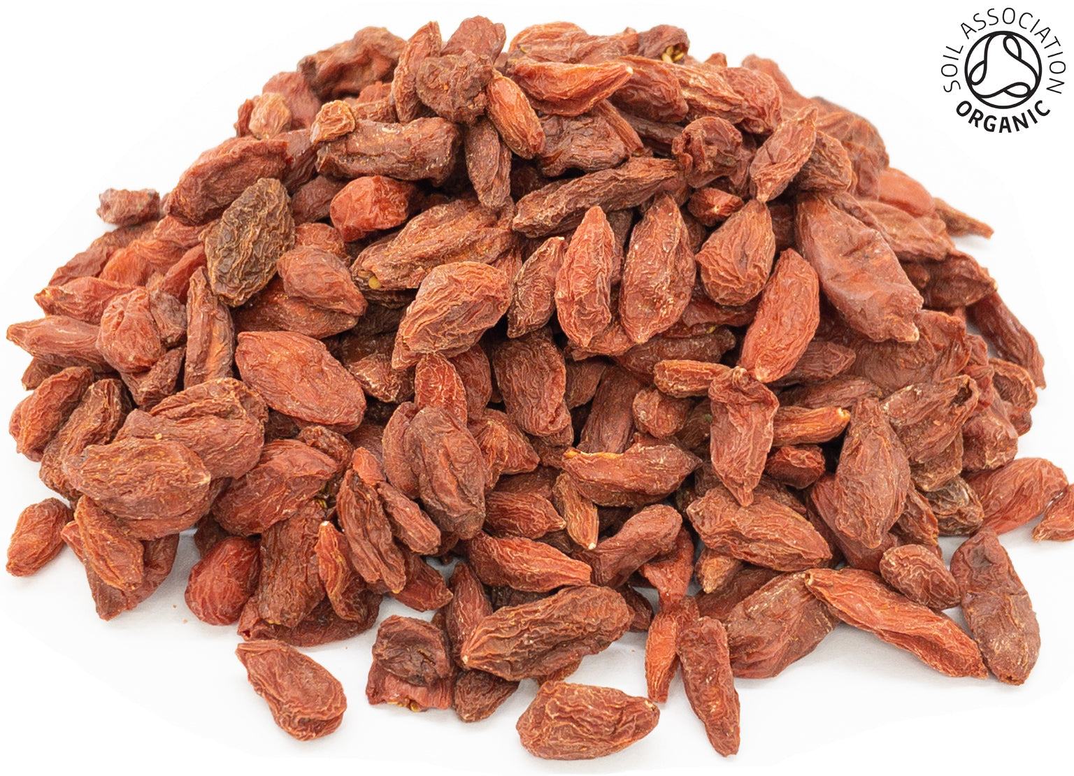 A small pile of dried, organic goji berries, on a white background with the Soil Association Organic Logo in the top right corner