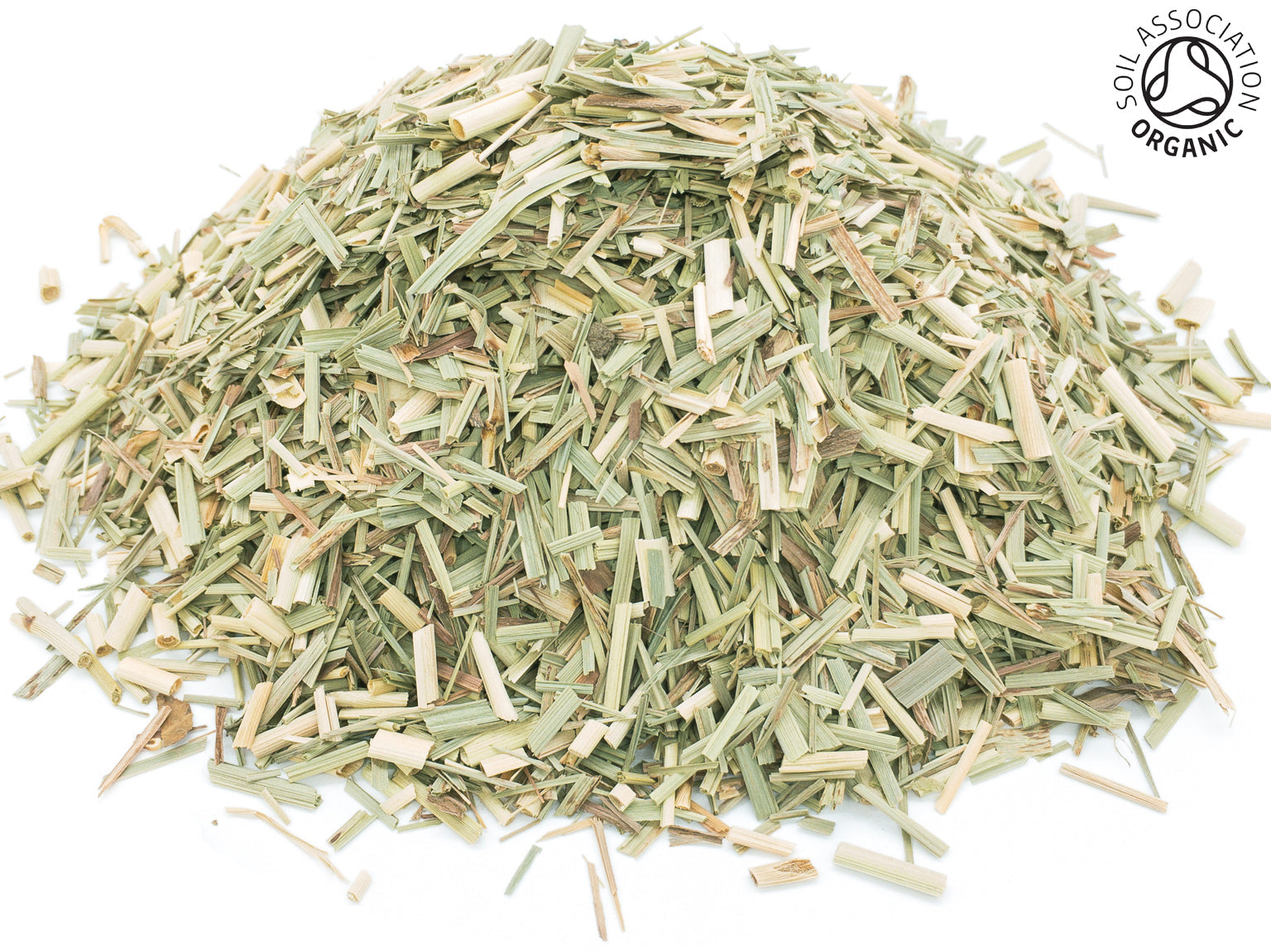 A small pile of dried, cut, organic lemon grass herb on a white background with the Soil Association Organic Logo in the top right corner