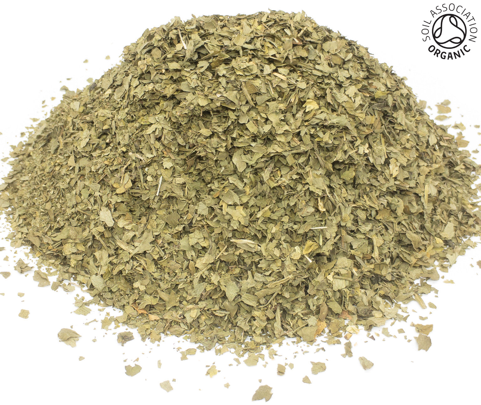 A small pile of dried, cut, organic parsley leaves on a white background with the Soil Association Organic Logo in the top right corner