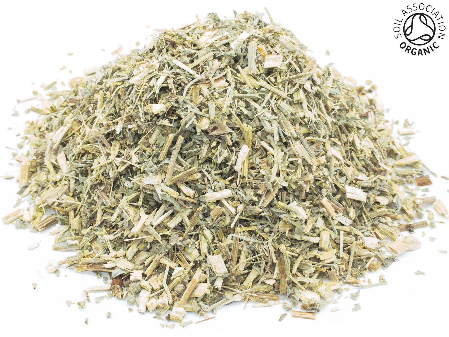 A small pile of dried, cut, organic wormwood herb leaf, stem and flower on a white background with the Soil Association Organic Logo in the top right corner