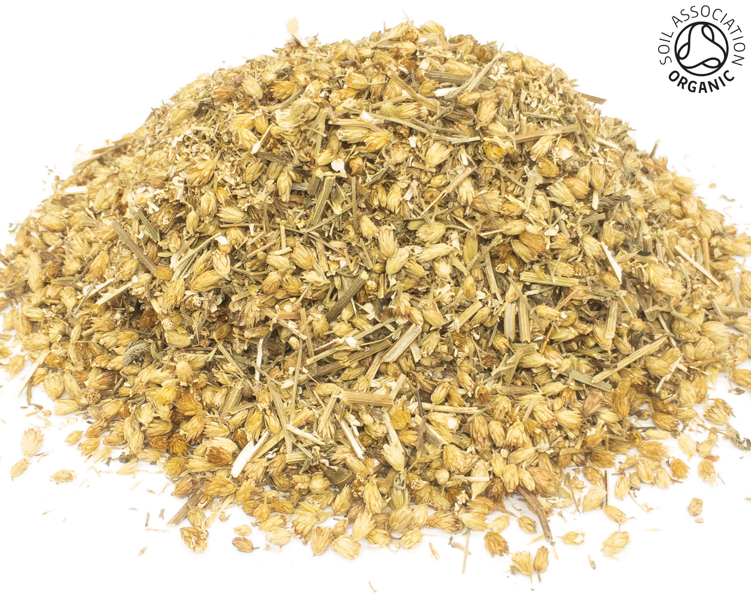 A small pile of dried, cut organic yellow yarrow flowers with stem pieces on a white background with the Soil Association Organic Logo in the top right corner