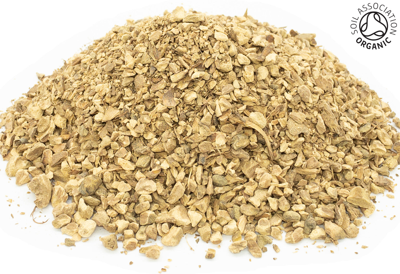 A small pile of dried, cut organic  yellow dock root on a white background with the Soil Association Organic Logo in the top right corner