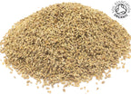 A small pile of dried, whole, organic anise seeds on a white background with the Soil Association Organic Logo in the top right corner