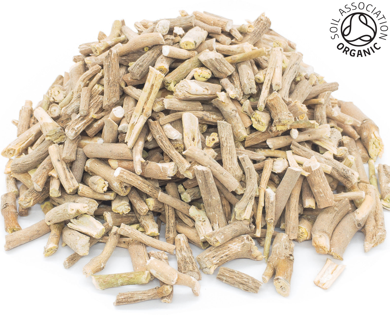 A small pile of dried, cut, organic ashwagandha root on a white background with the Soil Association Organic Logo in the top right corner