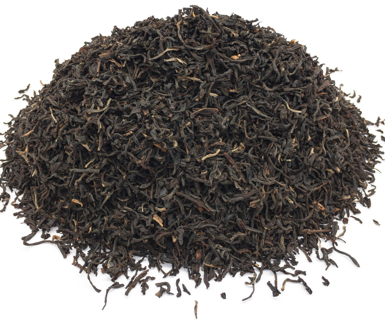 A small pile of Assam TGFOP black tea leaves on a white background