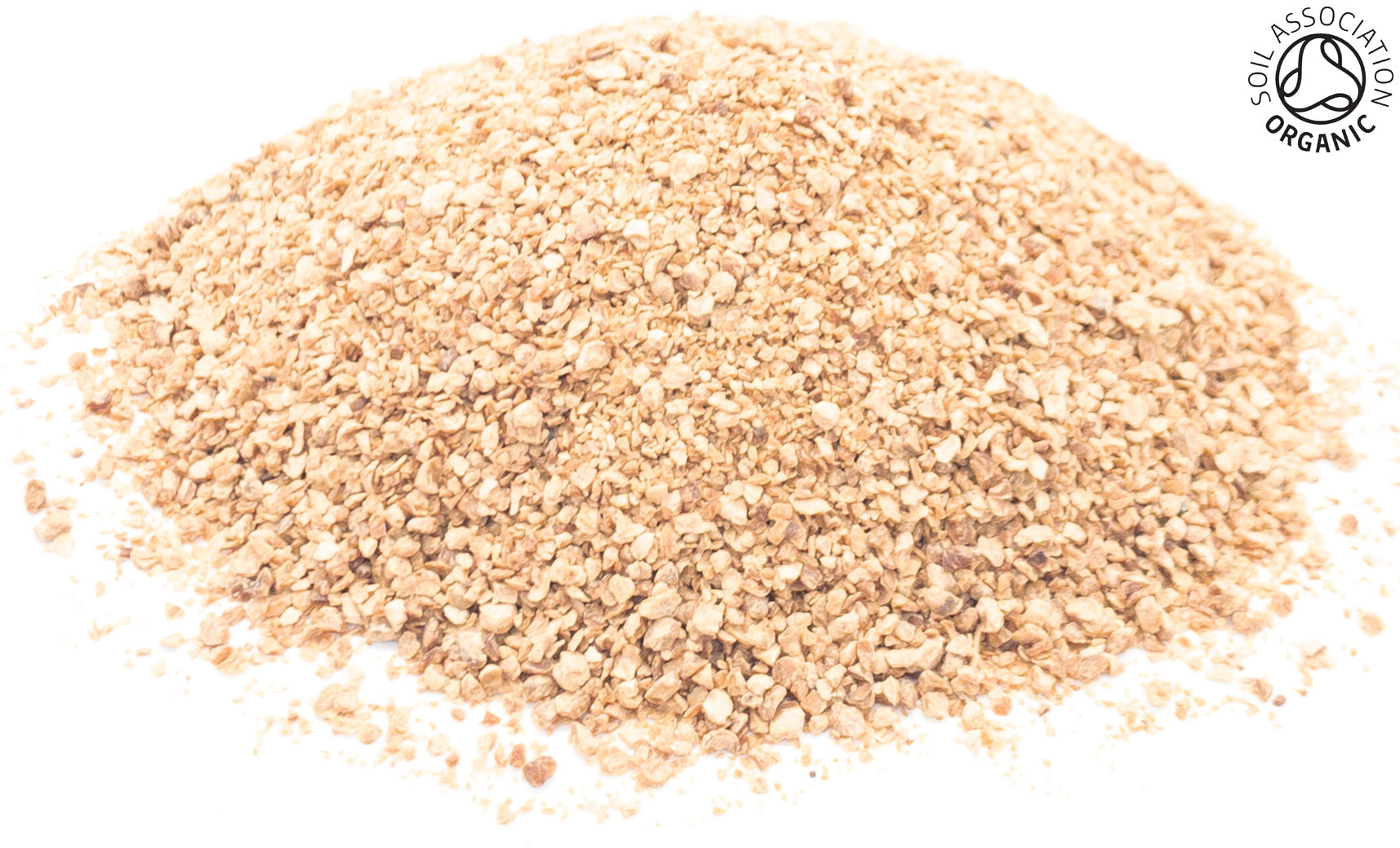 A small pile of dried, cut, organic baobab fruit pieces on a white background with the Soil Association Organic Logo in the top right corner