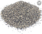 A small pile of organic cut cracked black pepper peppercorns on a white back ground with the Soil Association Organic Logo in the top right corner