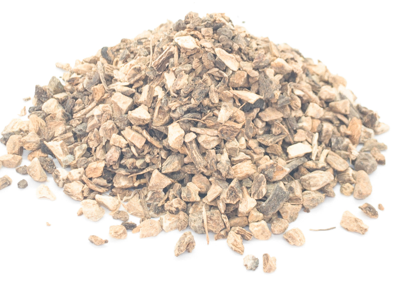 A small pile of dried, cut elecampane root on a white background