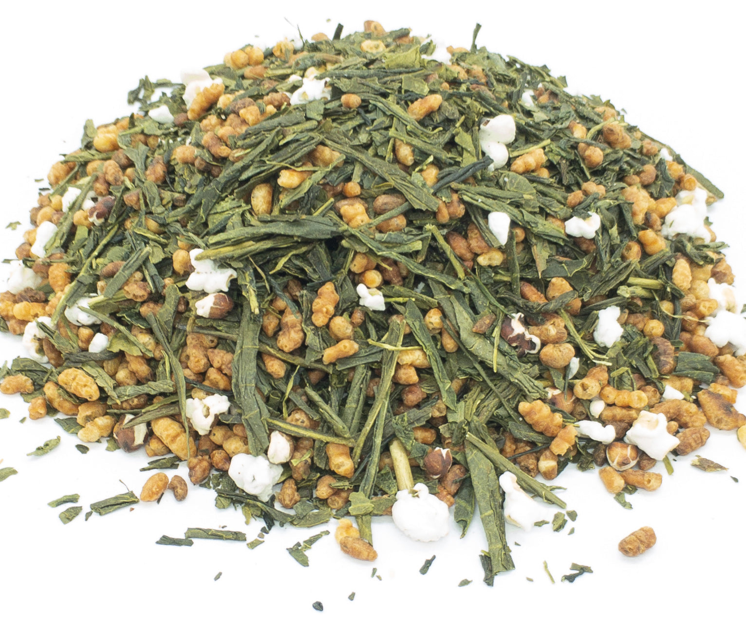 A small pile of dried, genmaicha green tea and toasted brown rice blend on a white background