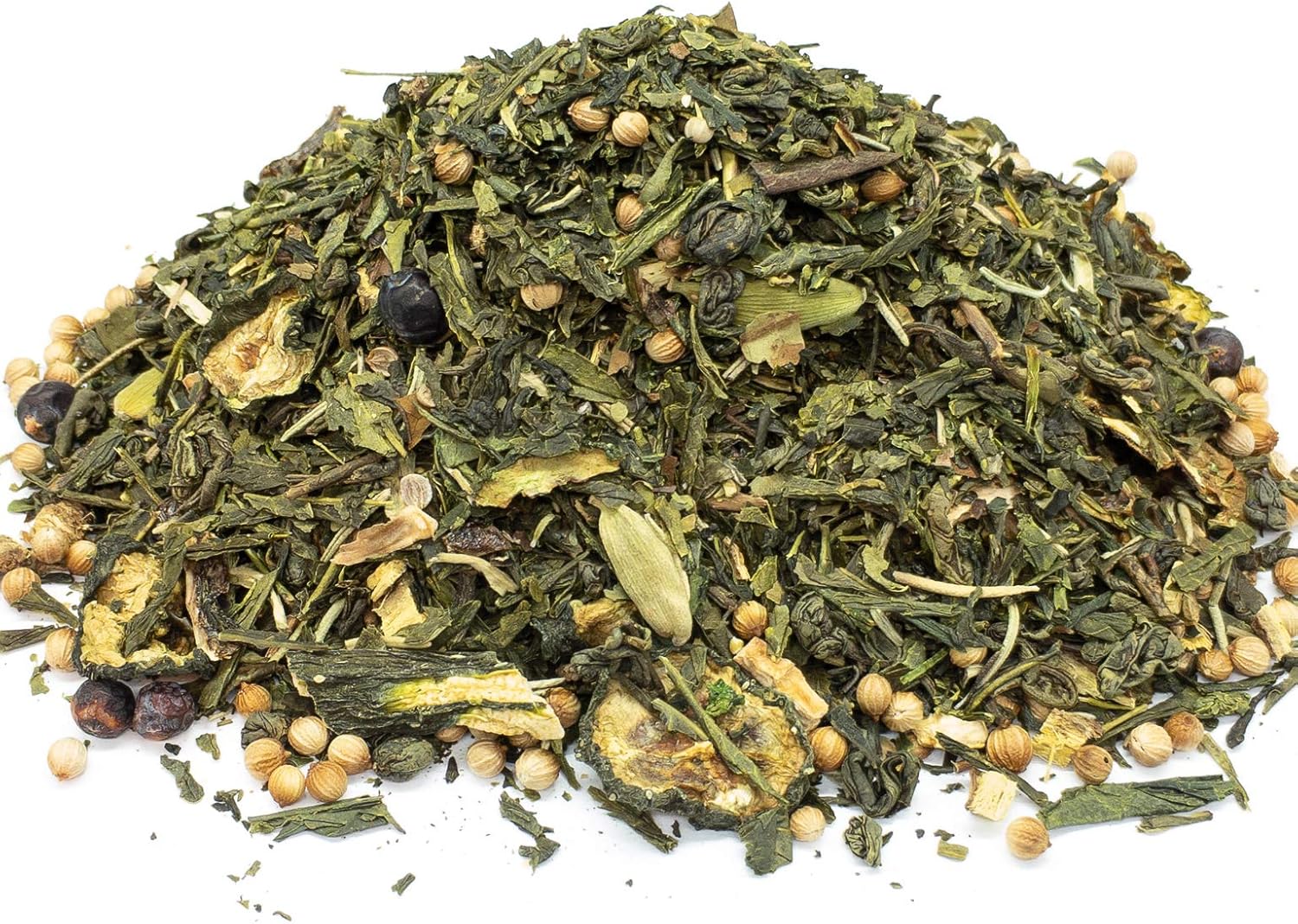 A small pile of our gin and tonic Herbal green tea blend on a white baxkground