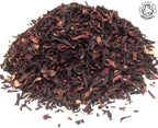 A small pile of dried, cut, organic hibiscus flower petals, on a white background with the Soil Association Organic Logo in the top right corner