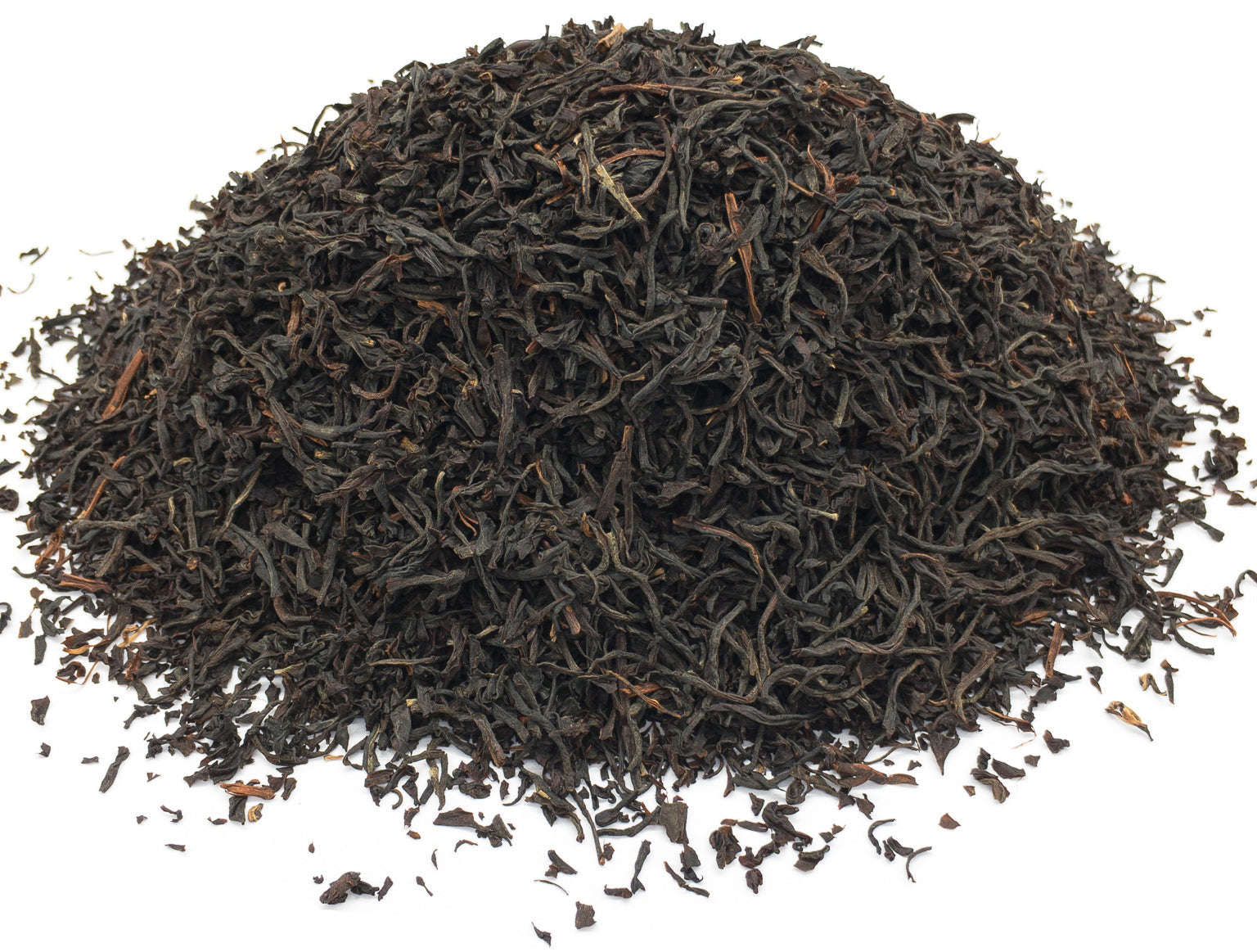A small pile of dried, black tea leaves from the Kosabei tea estate in Kenya, on a white background