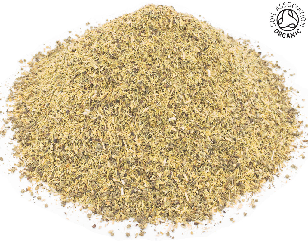 A small pile of dried, cut, organic liquorice root on a white background with the Soil Association Organic Logo in the top right corner