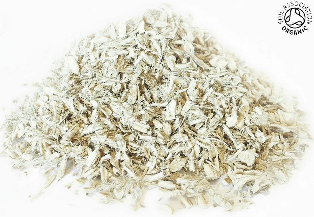 A small pile of organic marshmallow root pieces on a white background with the Soil Association organic logo in the top right hand corner