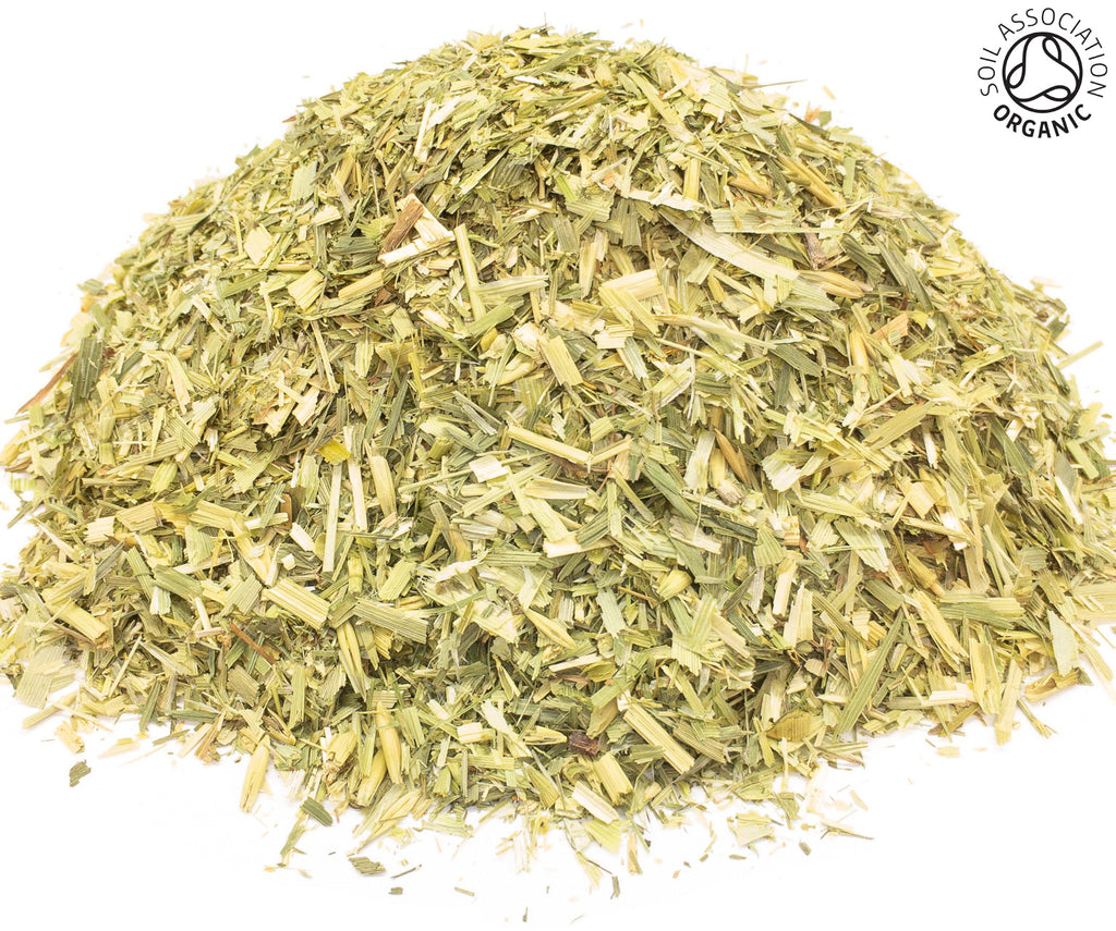 A small pile of dried, cut, organic oat straw flowering tops on a white background with the Soil Association Organic Logo in the top right corner