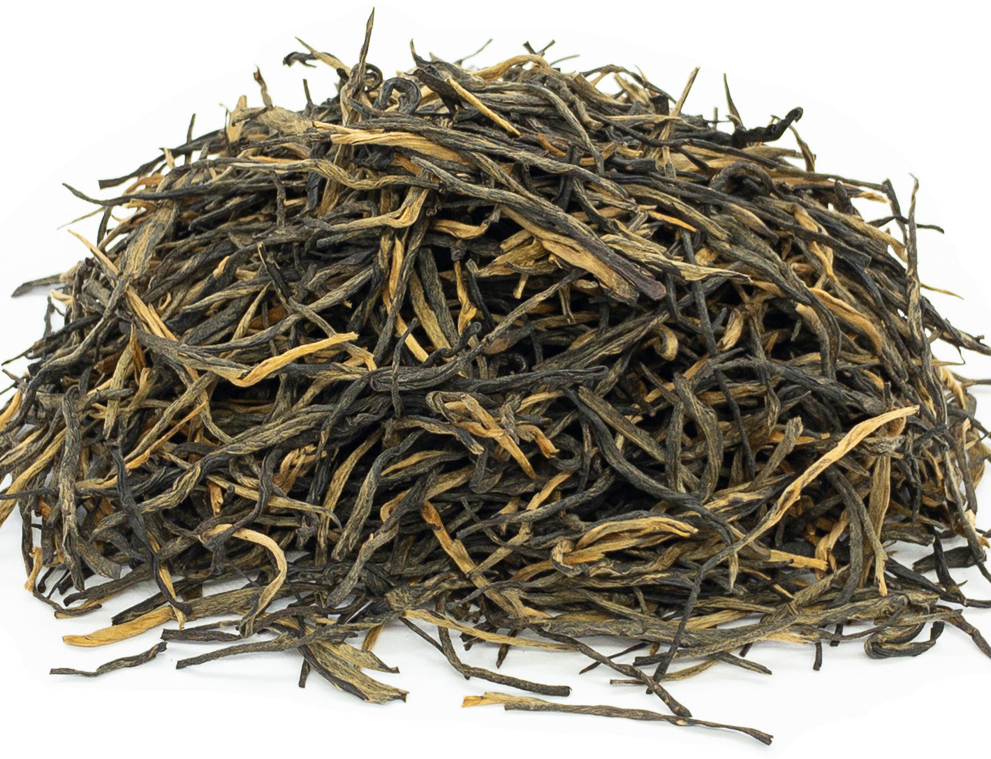 A small pile of dried, Peregrine Mountain black tea leaves on a white background