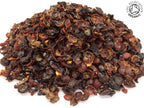 A small pile of dried, cut, organic rosehip fruit shells on a white background with the Soil Association Organic Logo in the top right corner