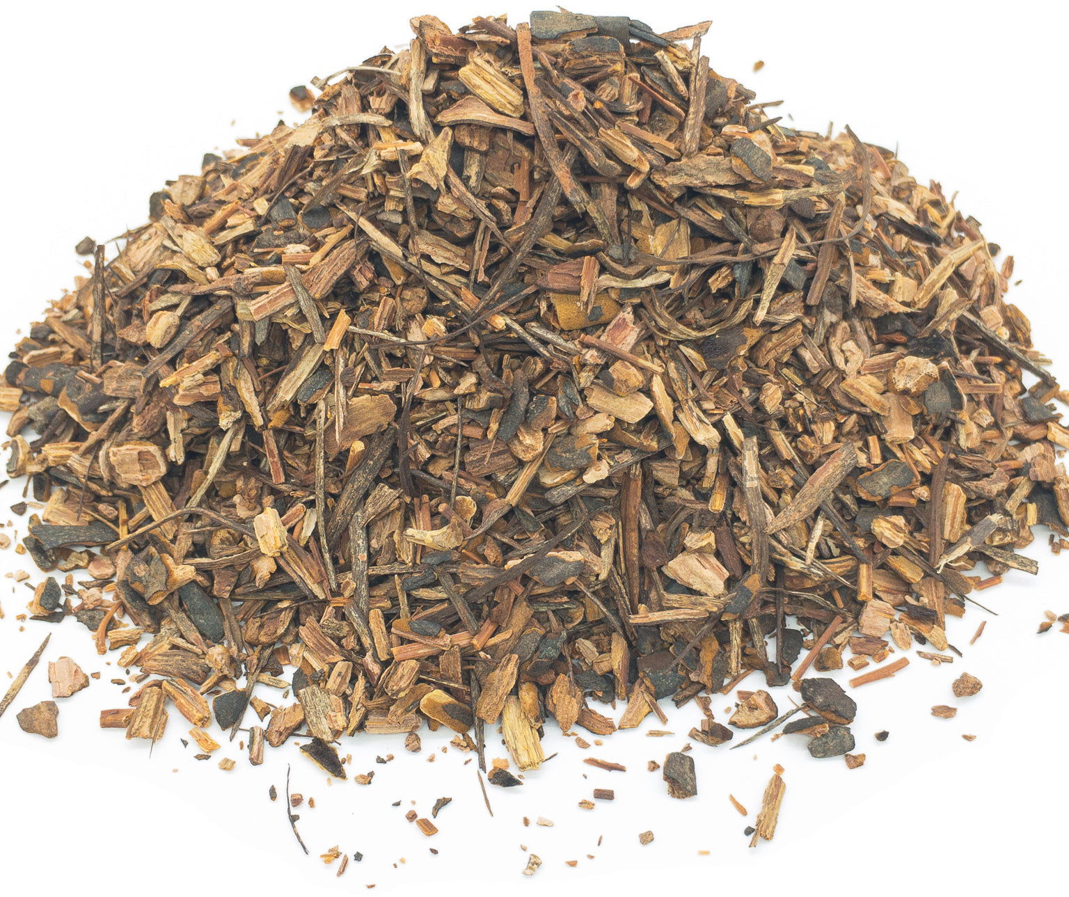 A small pile of dried, cut sarsaparilla root on a white background