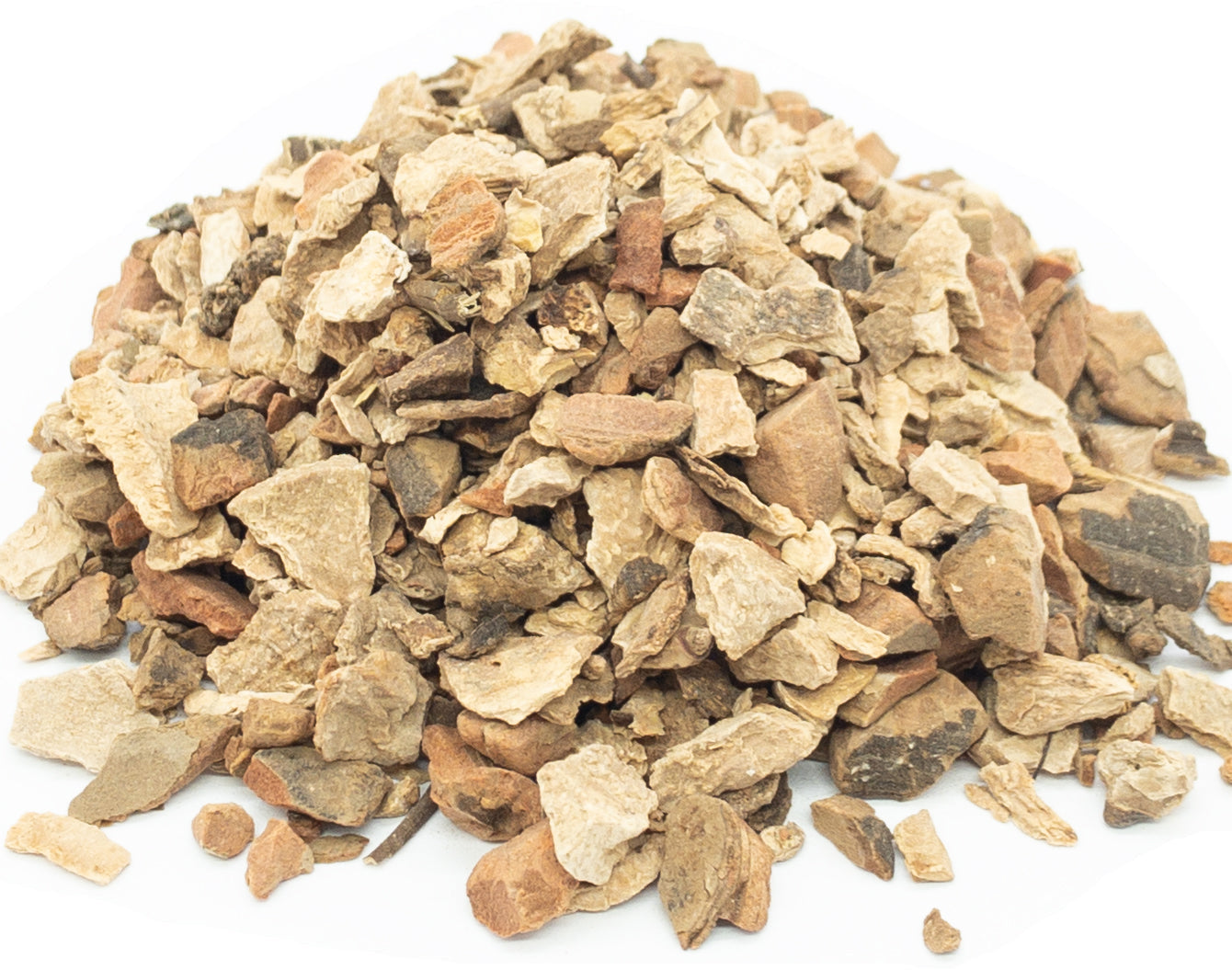 A small pile of cut wild yam root chippings on a white background